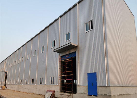 Magazzino prefabbricato moderno del metallo Q235 di progettazione, magazzino d'acciaio prefabbricato della parete di ENV